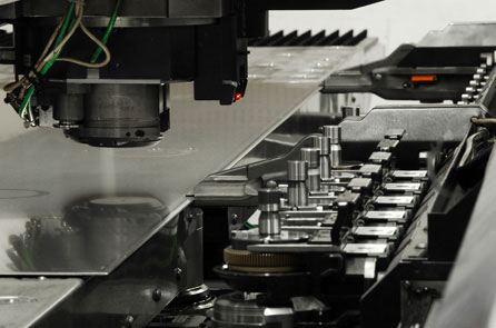 Sheet metal under laser machine during manufacturing process