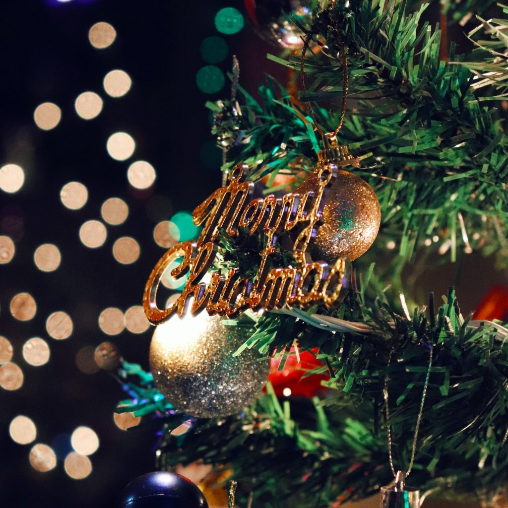 Merry Christmas photo of Christmas tree and ornaments by by Lalu Varghese