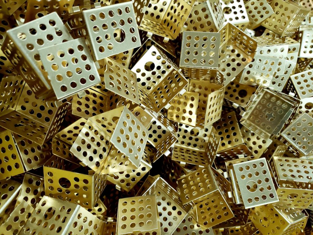 These parts are microwave EMI shields.