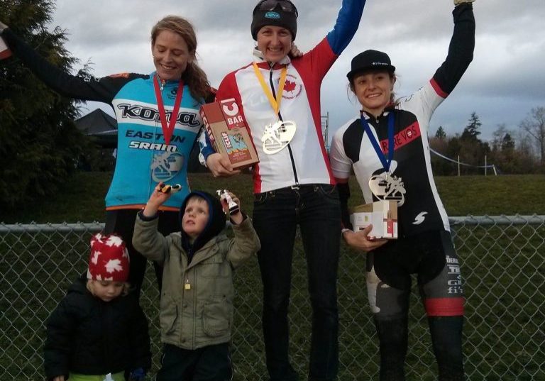 Cyclocross winners sporting medals manufactured by Hansen Industries
