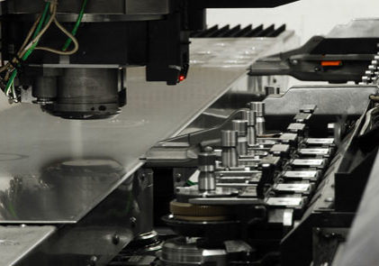Sheet metal under laser machine during manufacturing process